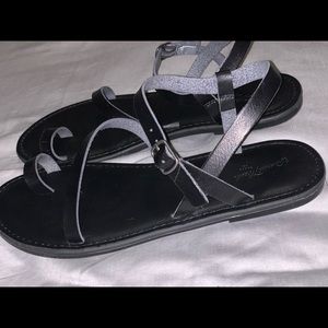 woman’s black sandals